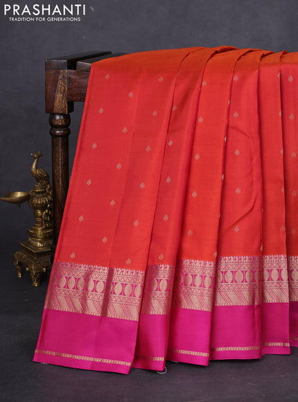Pure kanchipuram silk saree dual shade of rustic orange and magenta pink with allover zari woven buttas and rettapet zari woven border