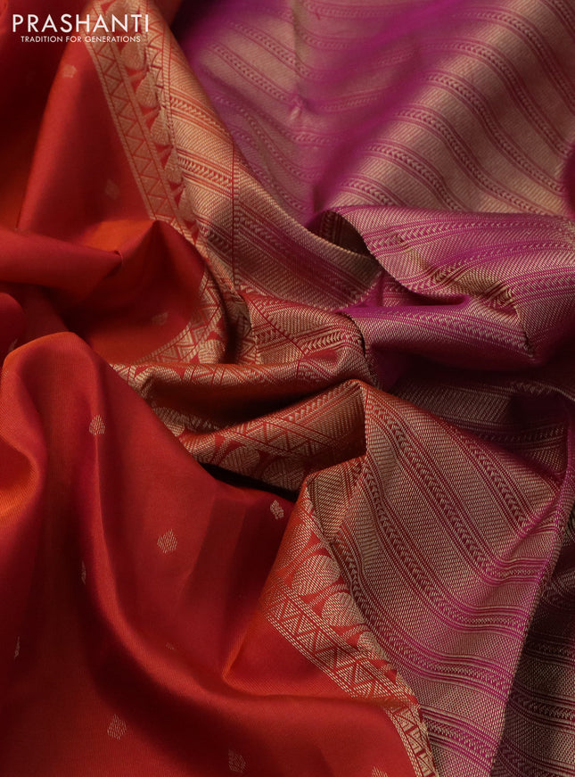Pure kanchipuram silk saree dual shade of rustic orange and magenta pink with allover zari woven buttas and rettapet zari woven border