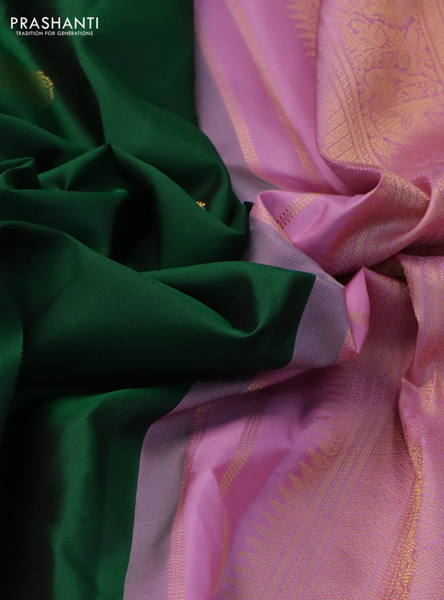 Pure kanchipuram silk saree green and light pink with zari woven buttas and zari woven korvai border