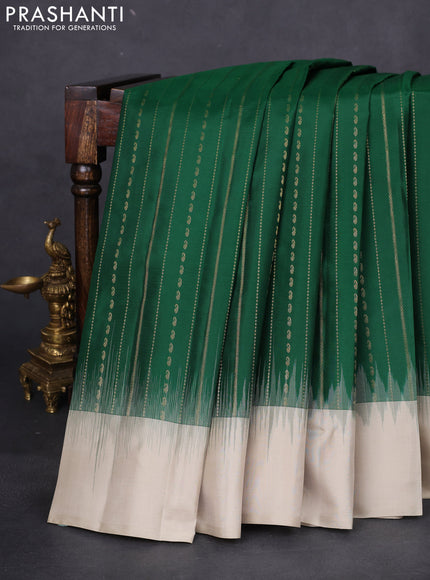 Pure kanchipuram silk saree green and beige with allover zari weaves and simple border