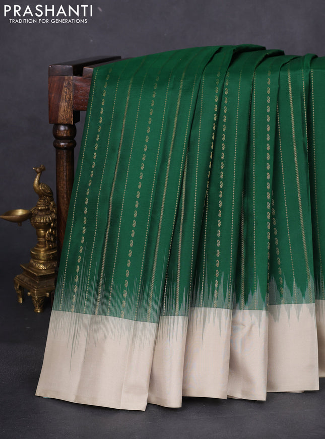 Pure kanchipuram silk saree green and beige with allover zari weaves and simple border