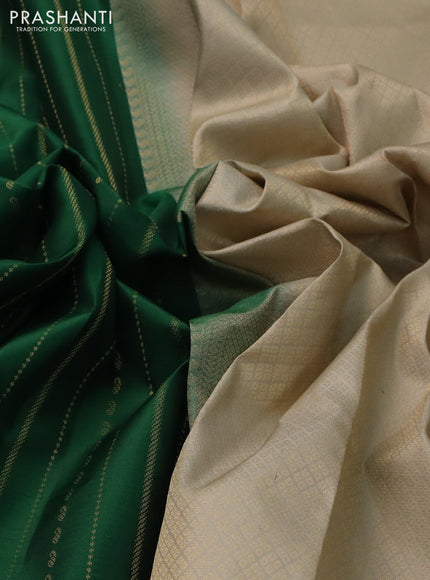 Pure kanchipuram silk saree green and beige with allover zari weaves and simple border