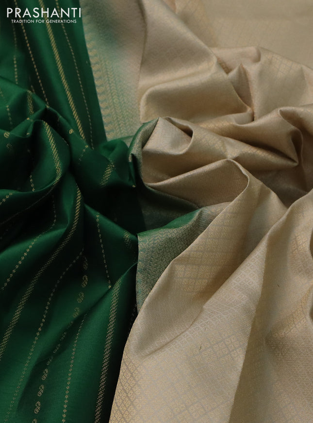 Pure kanchipuram silk saree green and beige with allover zari weaves and simple border