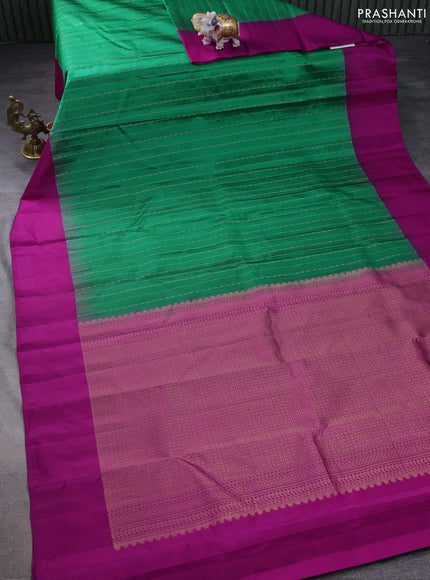 Pure kanchipuram silk saree green and purple with allover zari weaves and simple border