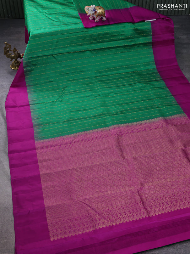 Pure kanchipuram silk saree green and purple with allover zari weaves and simple border