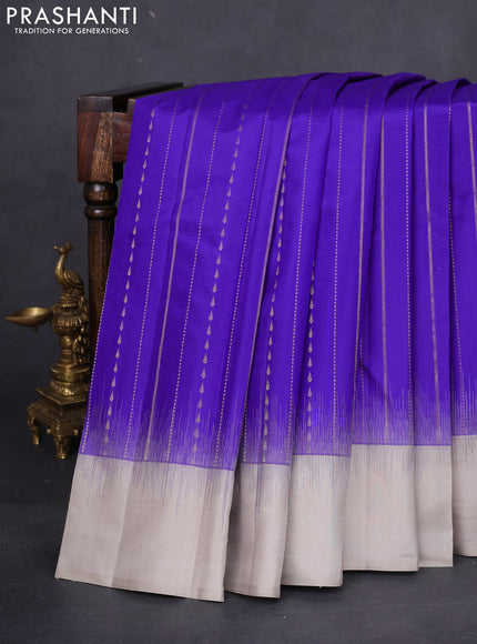 Pure kanchipuram silk saree blue and grey shade with allover zari weaves and simple border