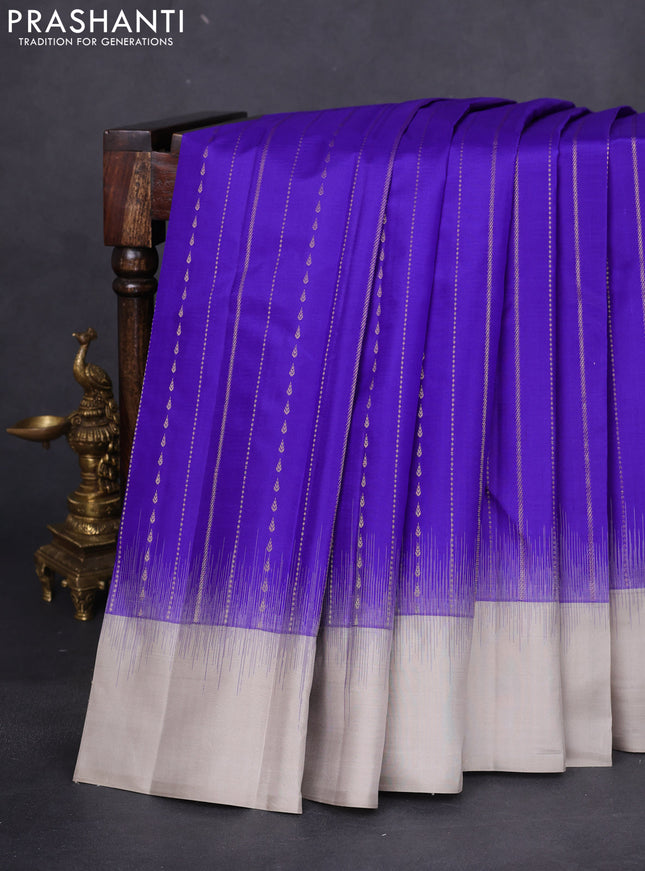 Pure kanchipuram silk saree blue and grey shade with allover zari weaves and simple border