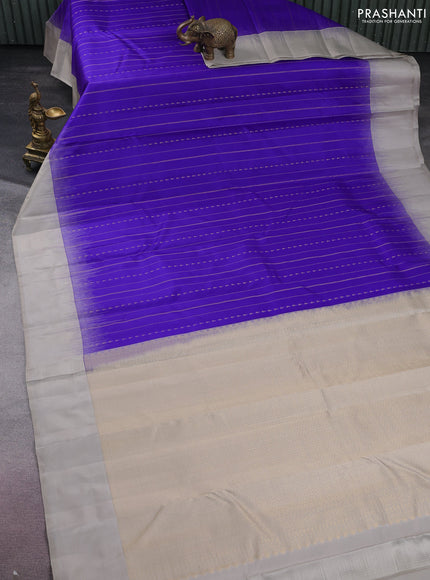 Pure kanchipuram silk saree blue and grey shade with allover zari weaves and simple border