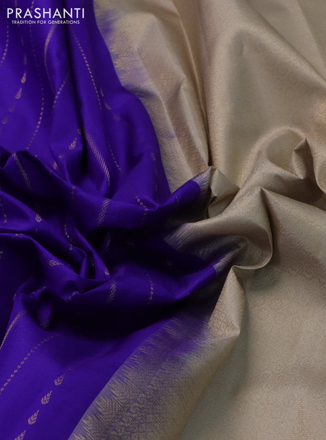 Pure kanchipuram silk saree blue and grey shade with allover zari weaves and simple border