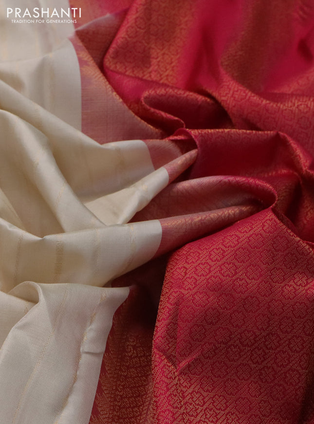 Pure kanchipuram silk saree cream and dark pink with allover zari weaves and simple border
