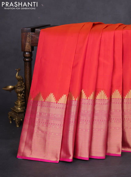 Pure kanchipuram silk saree dual shade of orange and pink with plain body and long temple zari woven border