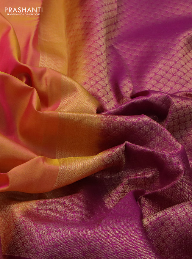 Pure kanchipuram silk saree dual shade of yellowish pink and purple with plain body and long temple zari woven border
