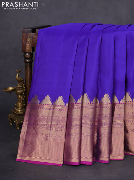 Pure kanchipuram silk saree blue and purple with plain body and long temple zari woven border