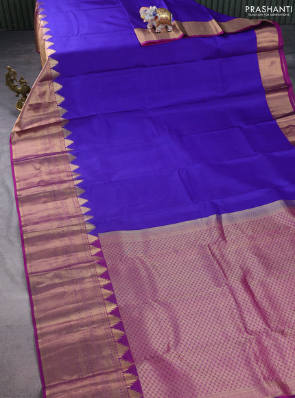 Pure kanchipuram silk saree blue and purple with plain body and long temple zari woven border