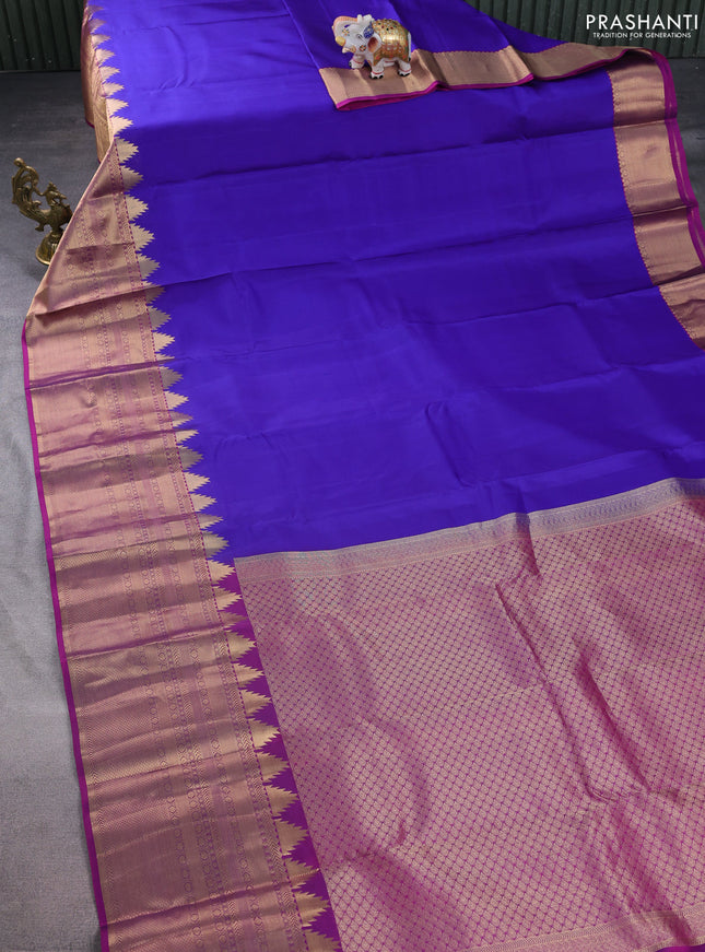 Pure kanchipuram silk saree blue and purple with plain body and long temple zari woven border