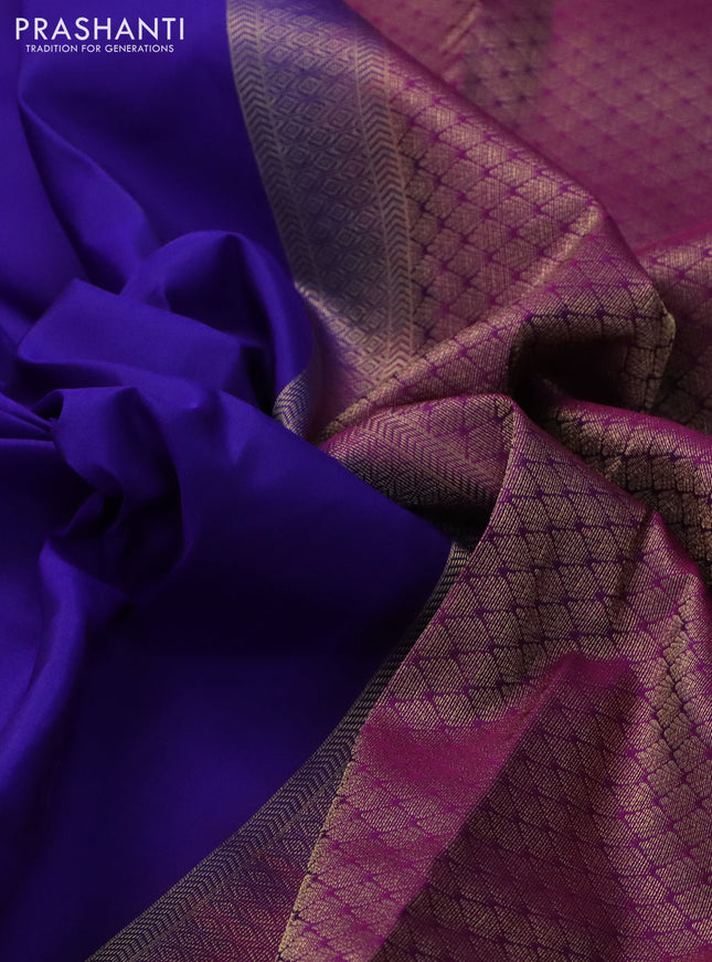 Pure kanchipuram silk saree blue and purple with plain body and long temple zari woven border