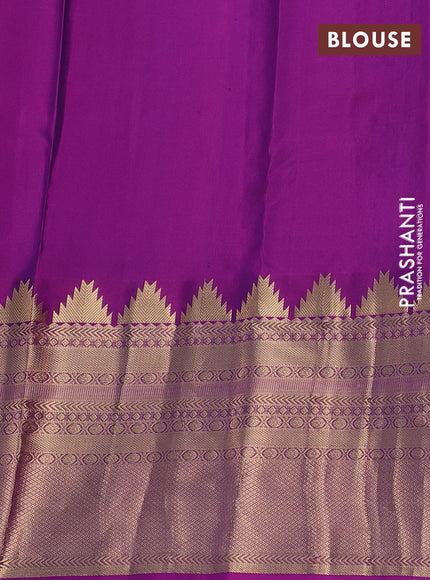Pure kanchipuram silk saree blue and purple with plain body and long temple zari woven border