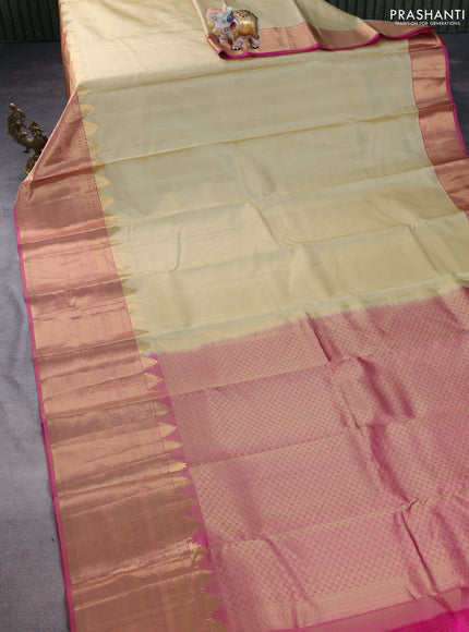 Pure kanchipuram silk saree cream and dual shade of pink with plain body and long temple zari woven border