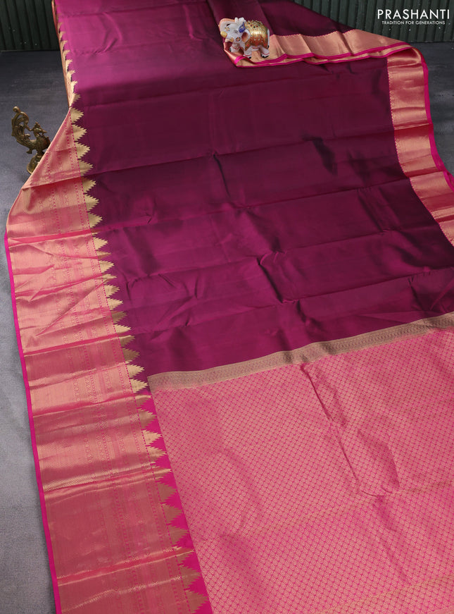 Pure kanchipuram silk saree dark magenta pink and pink with plain body and long temple zari woven border