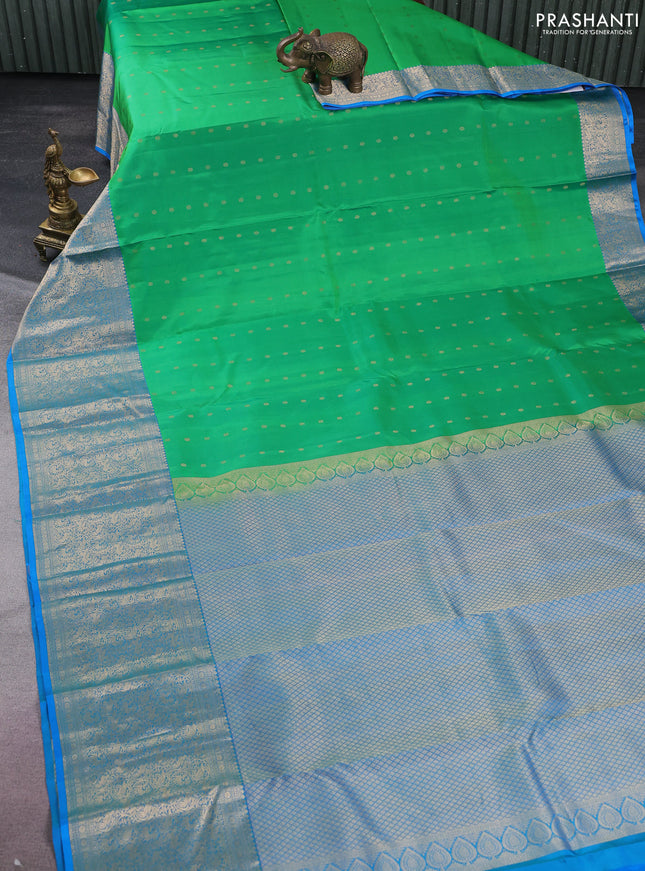 Pure kanchipuram silk saree green and cs blue with allover zari woven 1000 buttas and long rich zari woven border