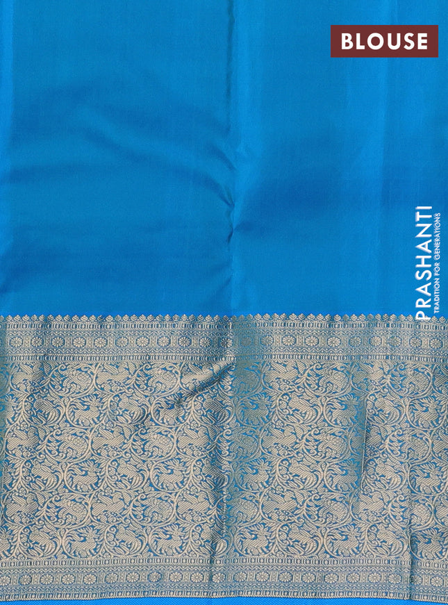 Pure kanchipuram silk saree green and cs blue with allover zari woven 1000 buttas and long rich zari woven border