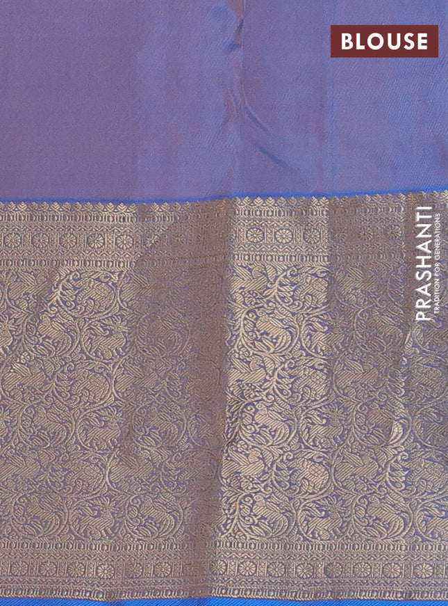 Pure kanchipuram silk saree peach shade and dual shade of blue with allover zari woven buttas and long zari woven korvai border