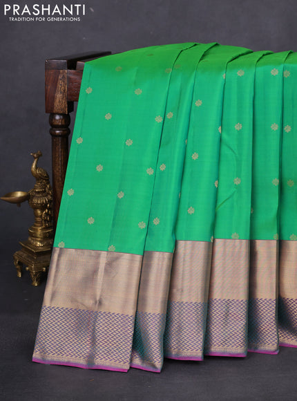 Pure kanchipuram silk saree green and purple with allover zari woven buttas and long zari woven border