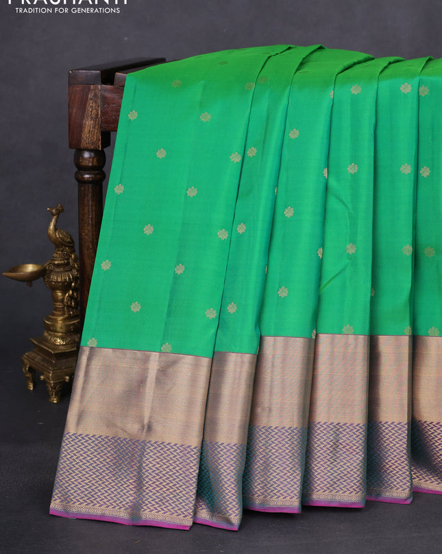Pure kanchipuram silk saree green and purple with allover zari woven buttas and long zari woven border