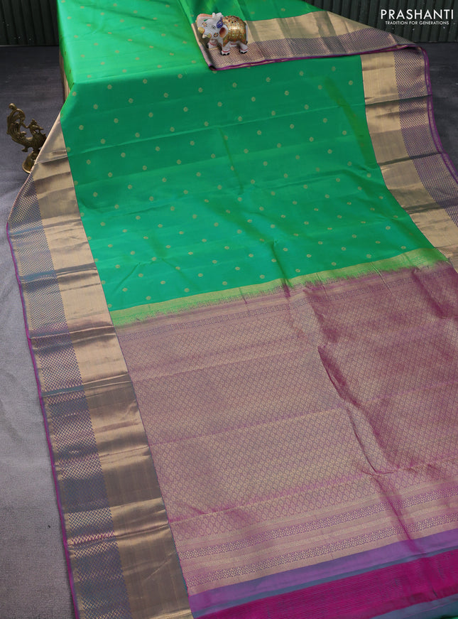 Pure kanchipuram silk saree green and purple with allover zari woven buttas and long zari woven border