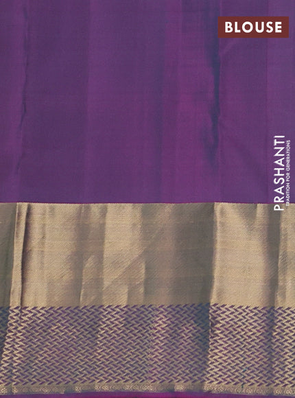 Pure kanchipuram silk saree green and purple with allover zari woven buttas and long zari woven border