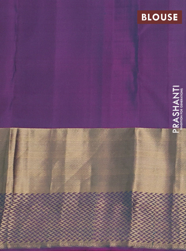 Pure kanchipuram silk saree green and purple with allover zari woven buttas and long zari woven border