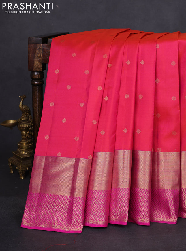 Pure kanchipuram silk saree dual shade of pinkish orange and pink with allover zari woven buttas and long zari woven border