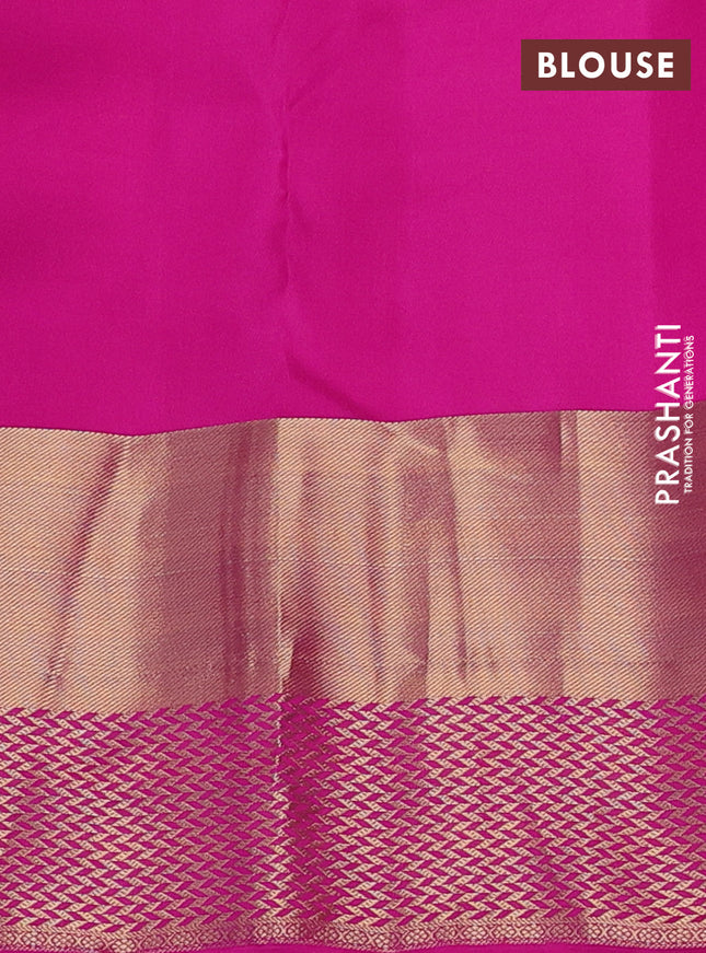 Pure kanchipuram silk saree dual shade of pinkish orange and pink with allover zari woven buttas and long zari woven border