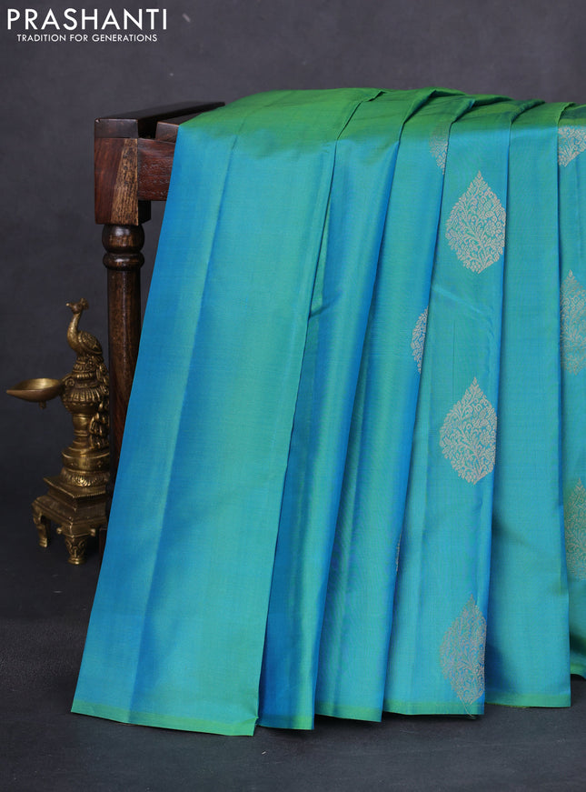 Pure kanchipuram silk saree dual shade of teal blue and bottle green with zari woven buttas in borderless style
