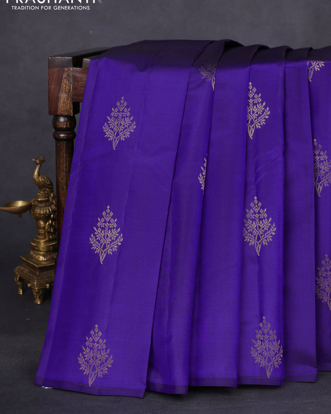 Pure kanchipuram silk saree blue and mustard yellow with zari woven buttas in borderless style