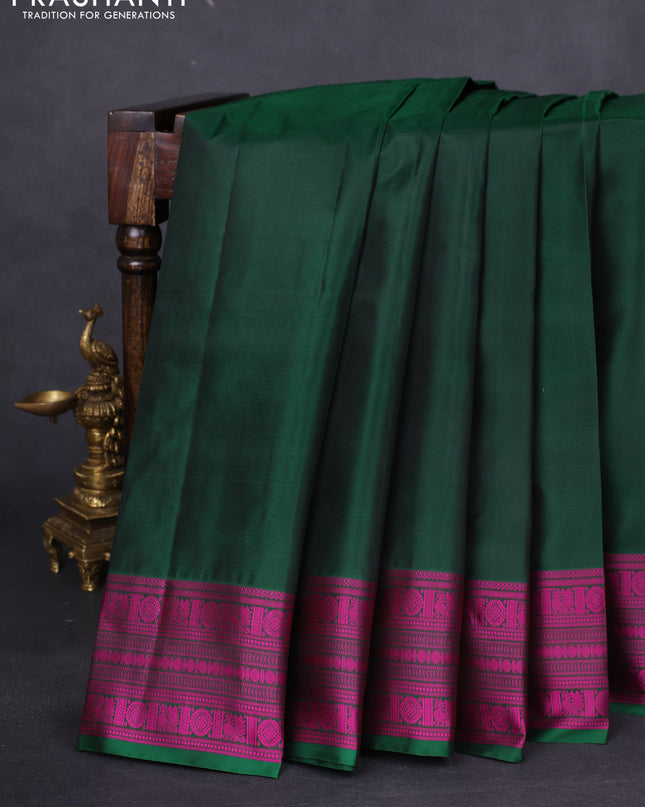Pure kanchipuram silk saree bottle green and pink with plain body and thread woven border