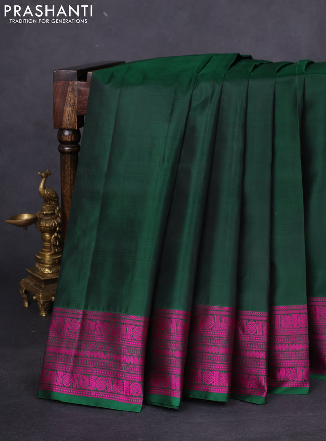 Pure kanchipuram silk saree bottle green and pink with plain body and thread woven border
