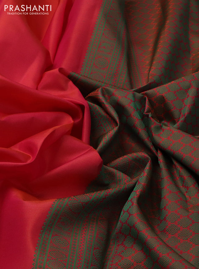 Pure kanchipuram silk saree dual shade of pinkish orange and green with plain body and thread woven border
