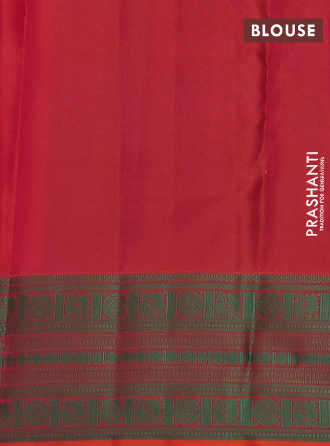 Pure kanchipuram silk saree dual shade of pinkish orange and green with plain body and thread woven border