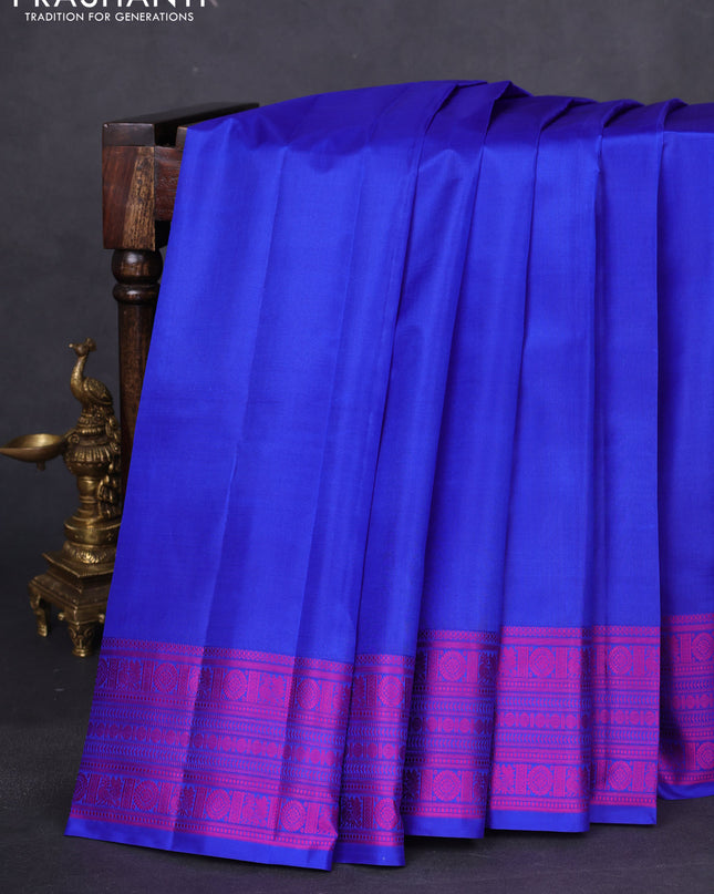Pure kanchipuram silk saree royal blue and pink with plain body and thread woven border