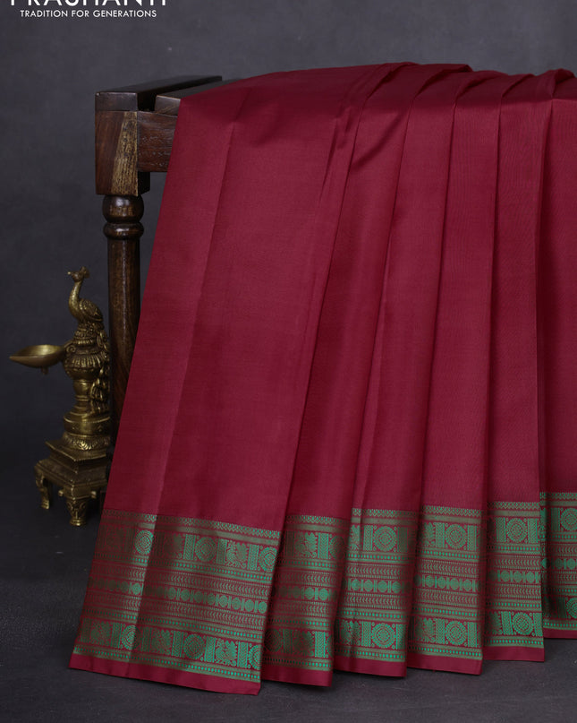 Pure kanchipuram silk saree maroon and green with plain body and thread woven border