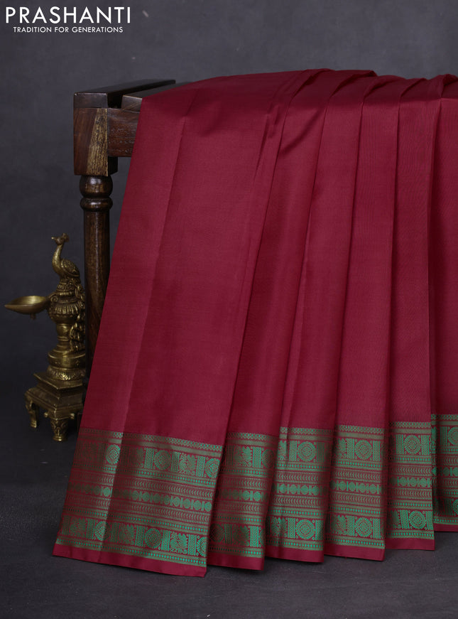 Pure kanchipuram silk saree maroon and green with plain body and thread woven border