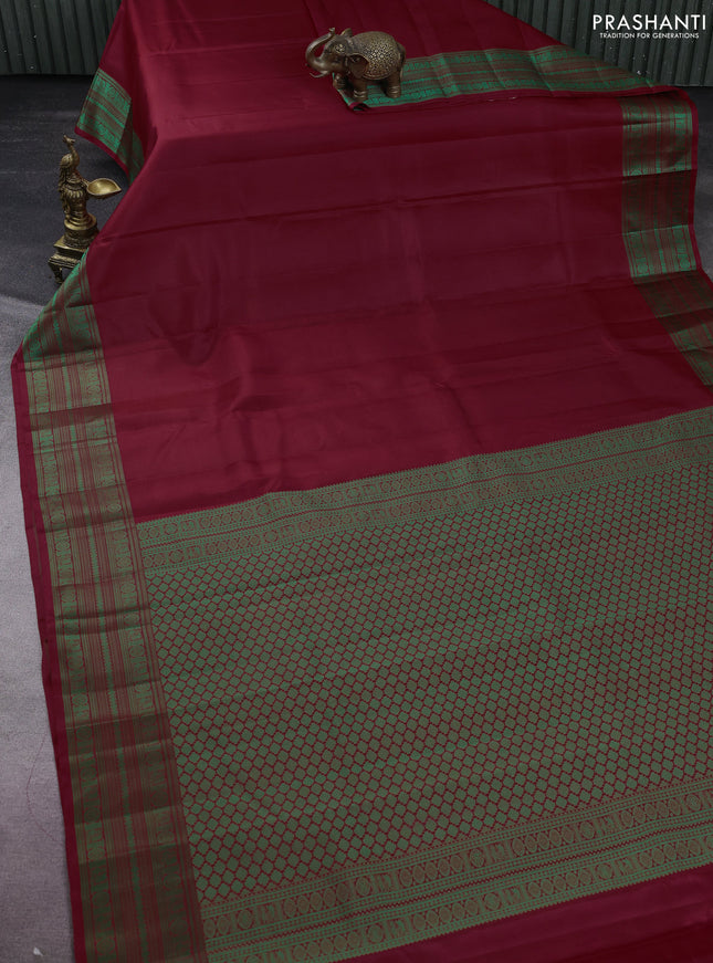 Pure kanchipuram silk saree maroon and green with plain body and thread woven border