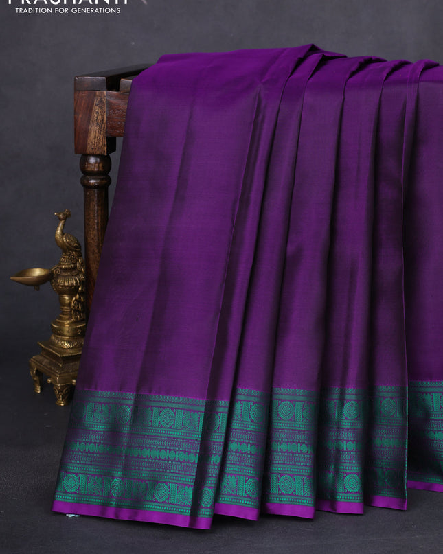 Pure kanchipuram silk saree purple and green with plain body and thread woven border