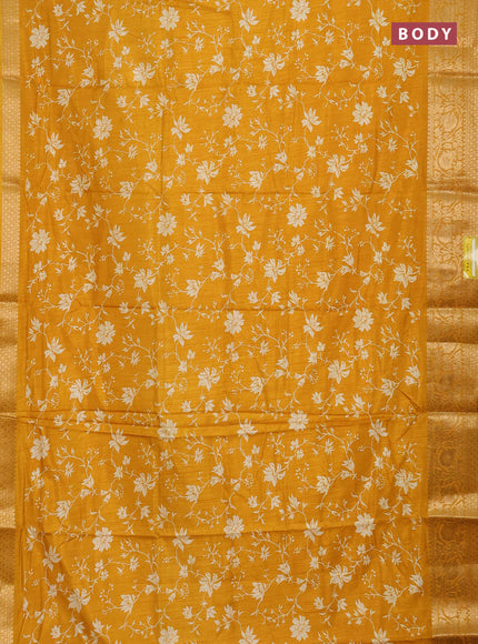 Semi dola saree mustard yellow with allover prints and zari woven border
