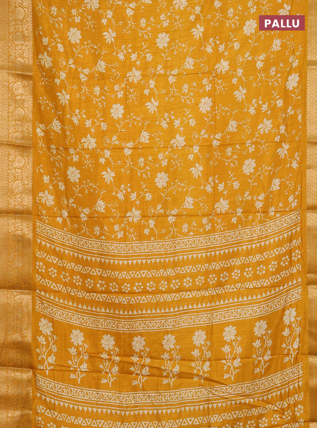 Semi dola saree mustard yellow with allover prints and zari woven border