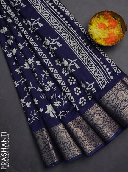 Semi dola saree blue with allover prints and zari woven border
