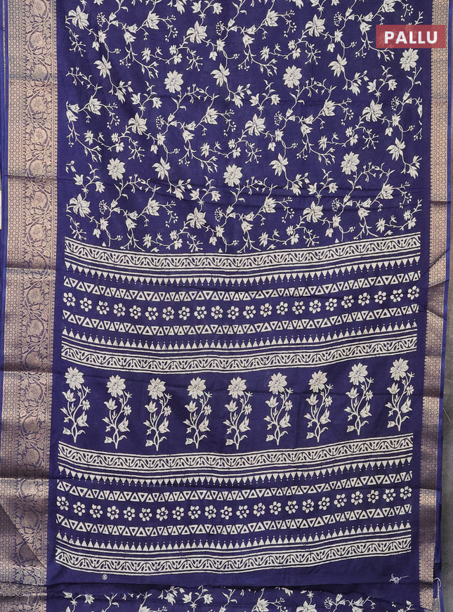 Semi dola saree blue with allover prints and zari woven border