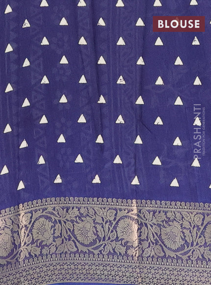 Semi dola saree blue with allover prints and zari woven border