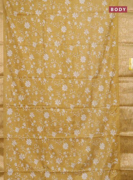 Semi dola saree pale yellow with allover prints and zari woven border